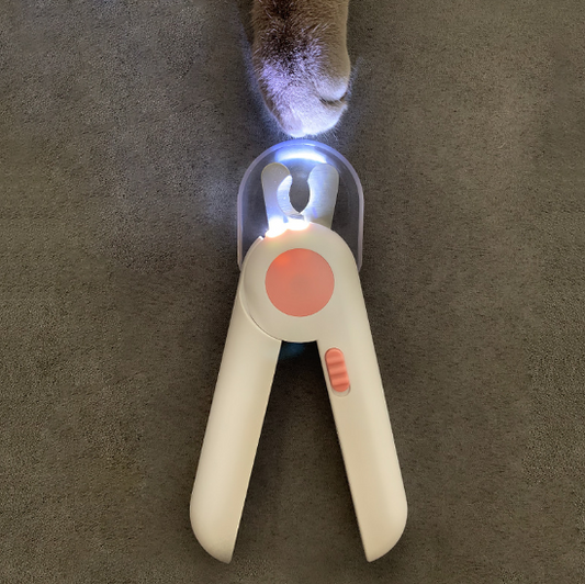 LED Pet Nail Clipper showing bright light for safe trimming